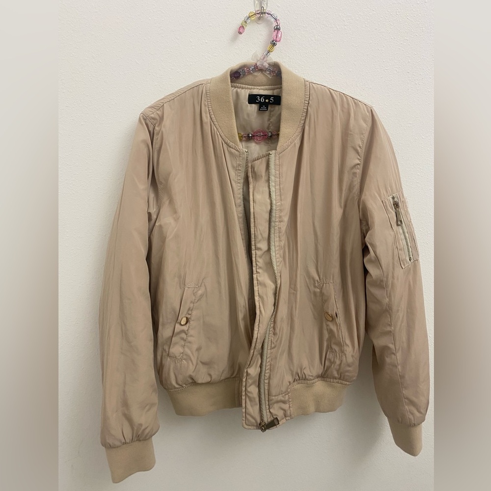 beige bomber jacket from the brand 36.5.